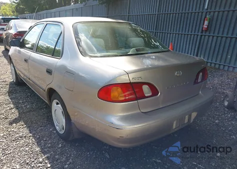 1999 Toyota Corolla Ce from USA, damaged, VIN 2T1BR12E1XC141396